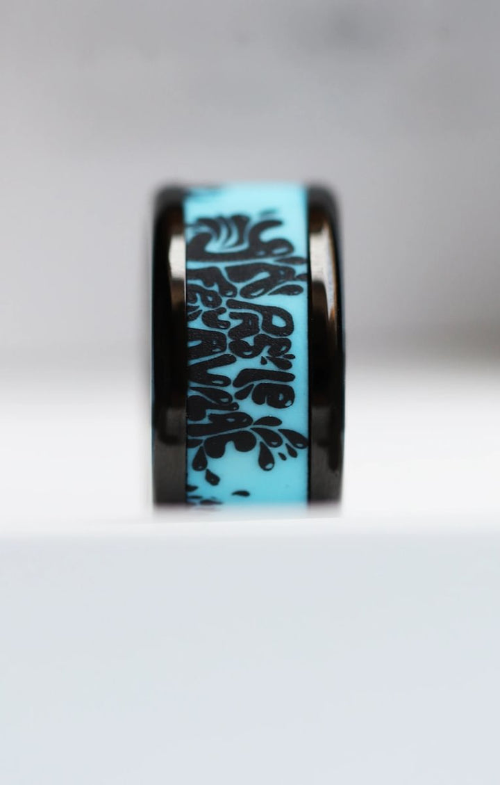 Inner ring in black and cyan polymer "Y'a pas le feu au lac" for mood ring
