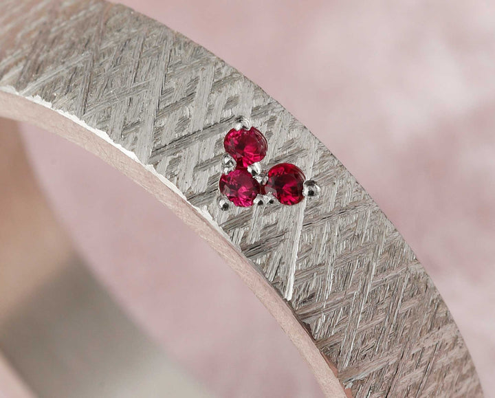 2/3 addon in crossed silver set with rubies