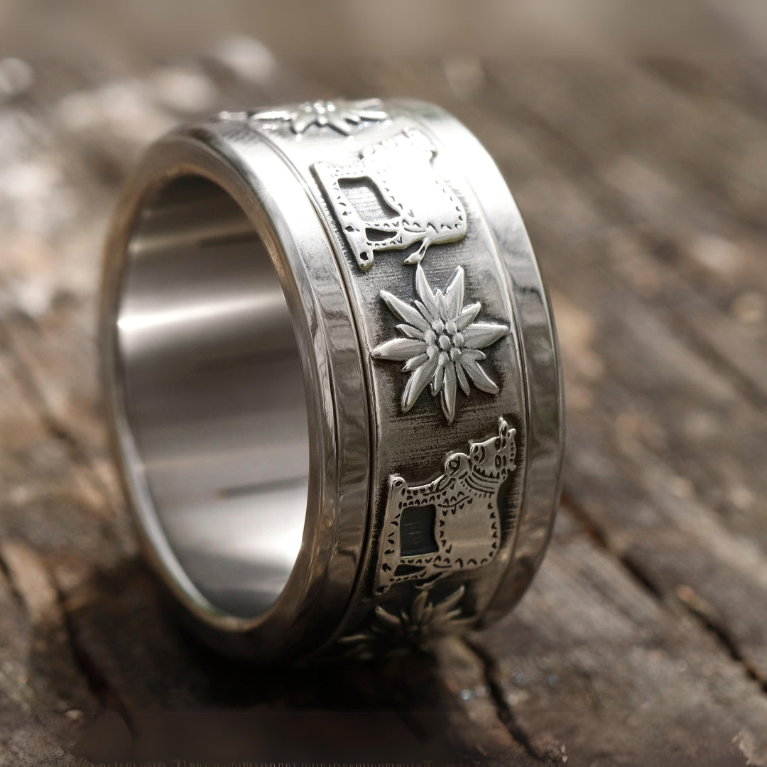 bague en argent pour homme et femme avec motifs de la suisse fleur edelweiss et vache alpage