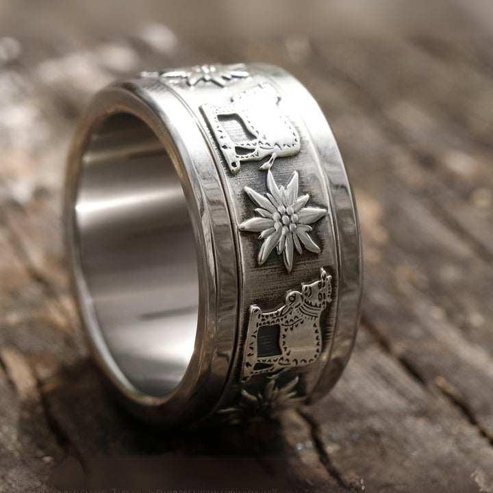 bague en argent pour homme et femme avec motifs de la suisse fleur edelweiss et vache alpage